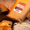arrangement-dinkelvollkornmehl-mit-broetchen-und-mehlsack